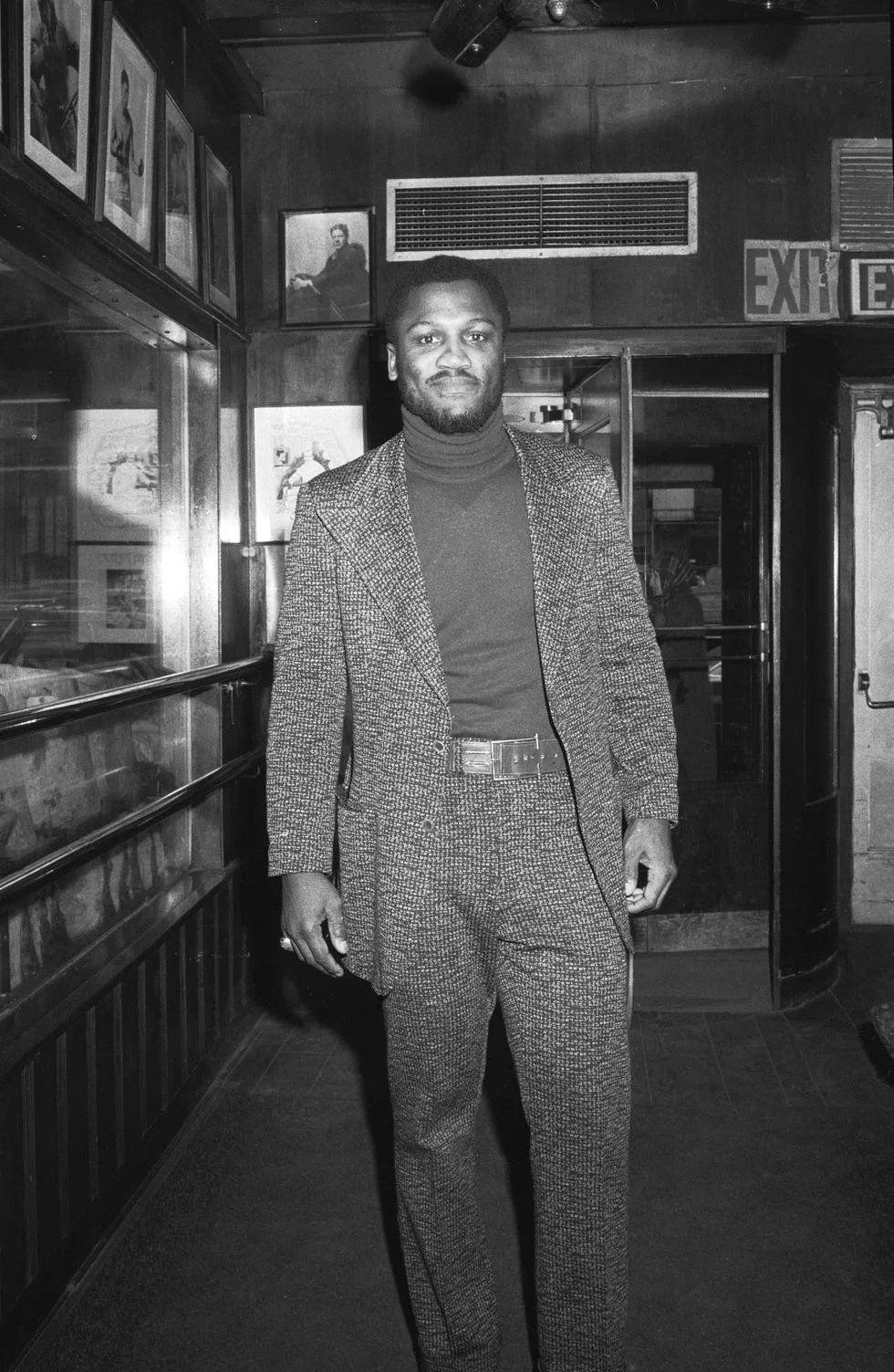 Portrait Of Joe Frazier boxing legend joe frazier wearing a turtleneck in the '70s.